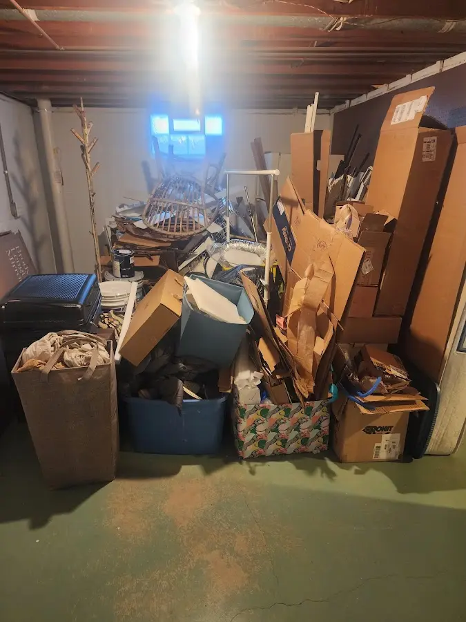 Roll-off dumpster container at job site for 15 Yard Dumpster Rental in Ypsilanti